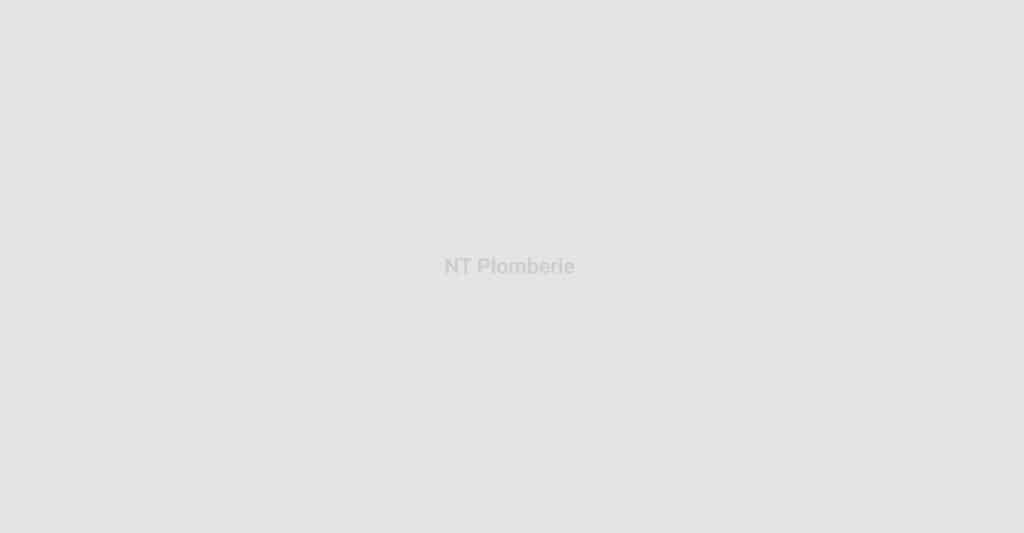 Texte NT Plomberie sur fond gris clair